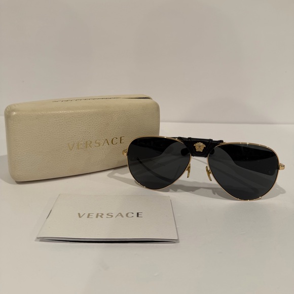 Versace Women\'s Sunglasses with Black and Gold Accents